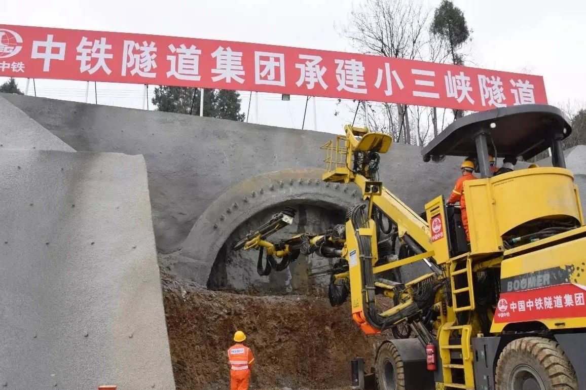 Comparison between Rock-drilling Jumbo and Manual Drilling-and-Blasting of Railway Tunnel